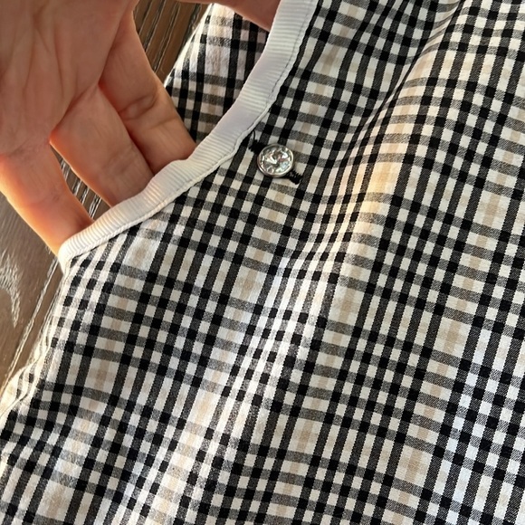 Izod of stretch black/ white/beige plaid skorts with black undershorts. Size 10. - Picture 3 of 11